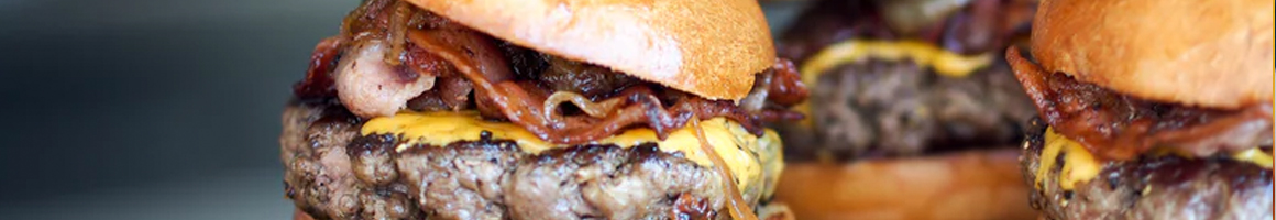 Eating American (Traditional) Burger at Shepard's Drive-In restaurant in Berlin, WI.